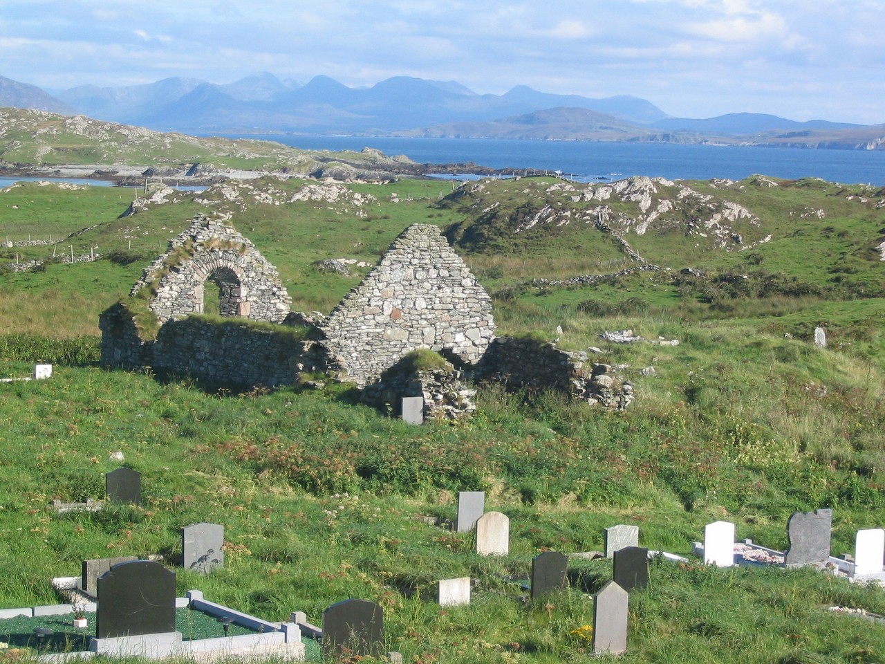 At the sheltered eastern end of the island is the 14th century ruins of St. Colman's church on the site of the monastery founded by the saint in 665. The island graveyard is still located here.
