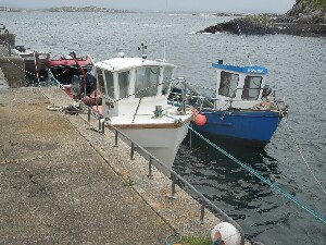 rainn Mhir - boats tied up at the quay near the lifeboat station on the east side of the island