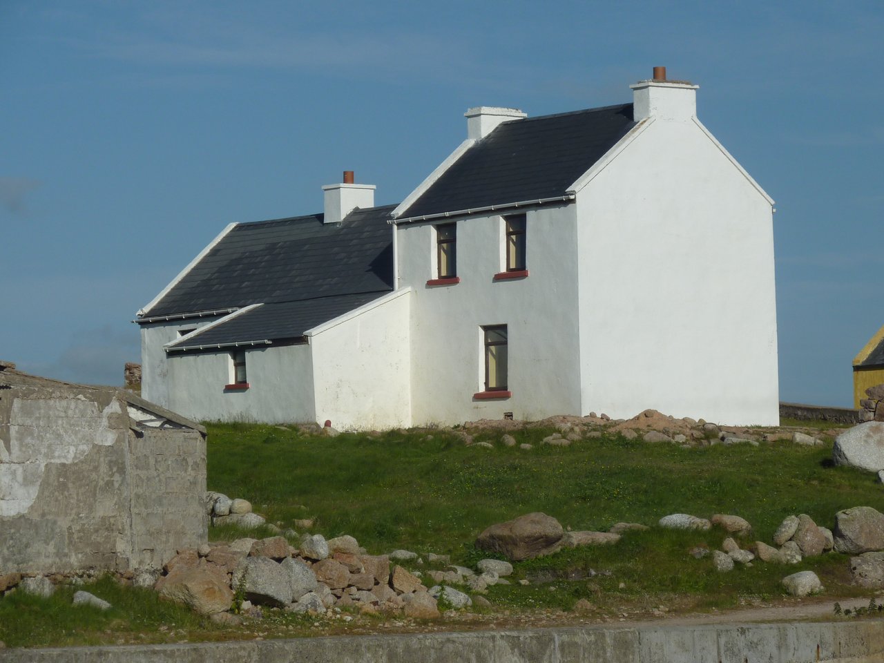 A house on Gola and Shags on sea cliffs